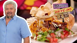 Guy Fieri Eats a Chimi Burrito in Miami FL  Diners DriveIns and Dives  Food Network [upl. by Ymia717]