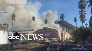 Wildfires in California spread dangerously close to Hollywood  ABC News [upl. by Ahseetal]