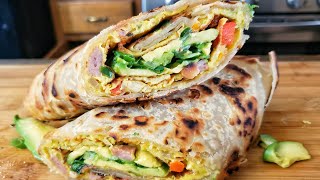 HOW TO MAKE CHAPATI WRAP  UGANDAN CHAPATI ROLEX  PARATHA ROLL  Egg Chapati Roll [upl. by Janith]