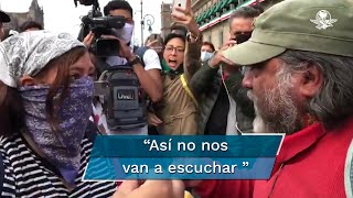 Hombre increpa a feminista durante marcha por los 43 de Ayotzinapa [upl. by Ayt176]