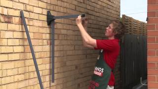 How To Install A Fold Down Clothesline  DIY At Bunnings [upl. by Amasa11]