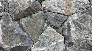 Secrets to creating a beautiful NATURAL STONE WALL Insights from a real stonemason [upl. by Lemra712]