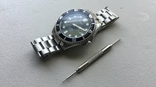 How to remove links and resize a cotterpin watch bracelet [upl. by Retsbew]