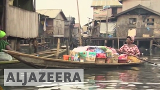 Residents of Nigerias floating slum thrive [upl. by Rainger450]