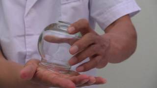 Chinese Glass Cupping Therapy  How to Create Suction Using Fire [upl. by Akenahc]