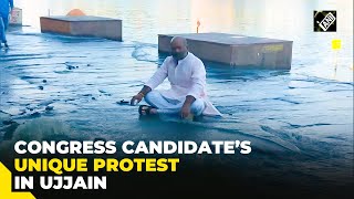 Congress Ujjain LS candidate Mahesh Parmar sits on protest amidst overflowing drain in Shipra [upl. by Aileve]