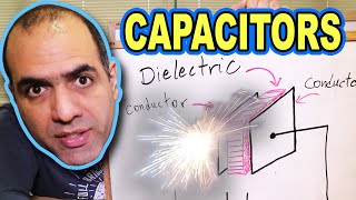 How CAPACITORS Work ElectroBOOM101006 [upl. by Nmutua]