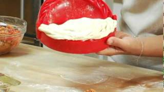 How to make the perfect Calzone using the Calzone Mold  WilliamsSonoma [upl. by Ahsemat]